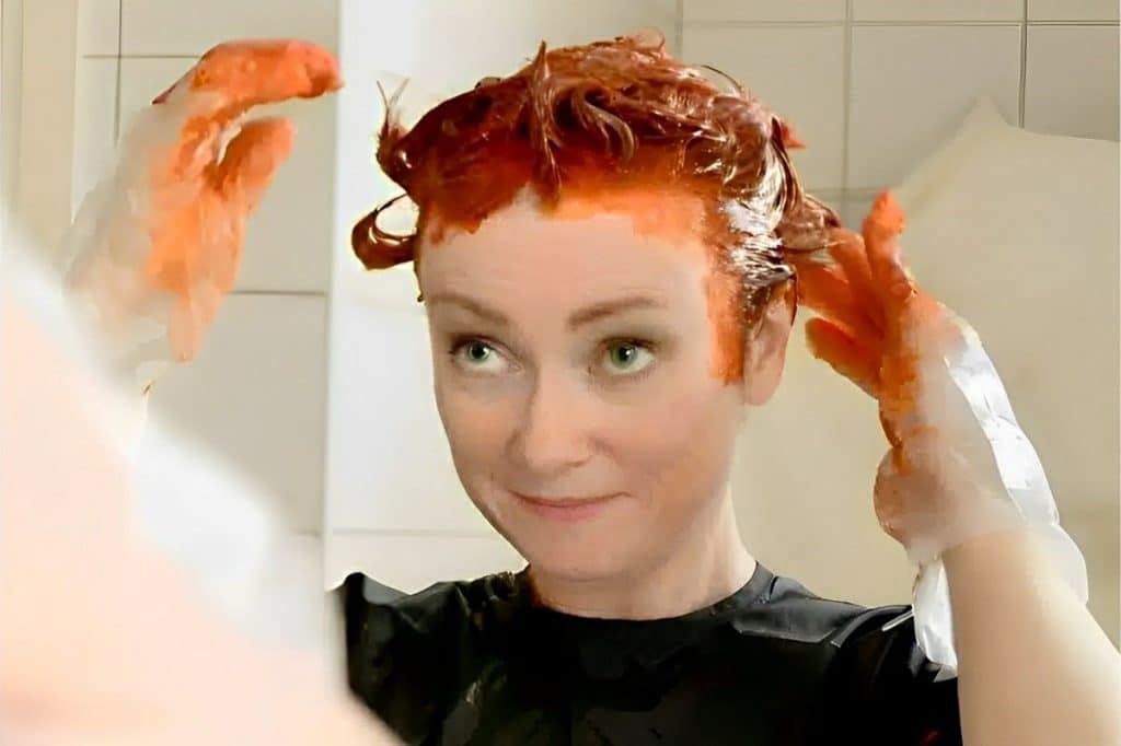 como limpar tinta de cabelo da pele