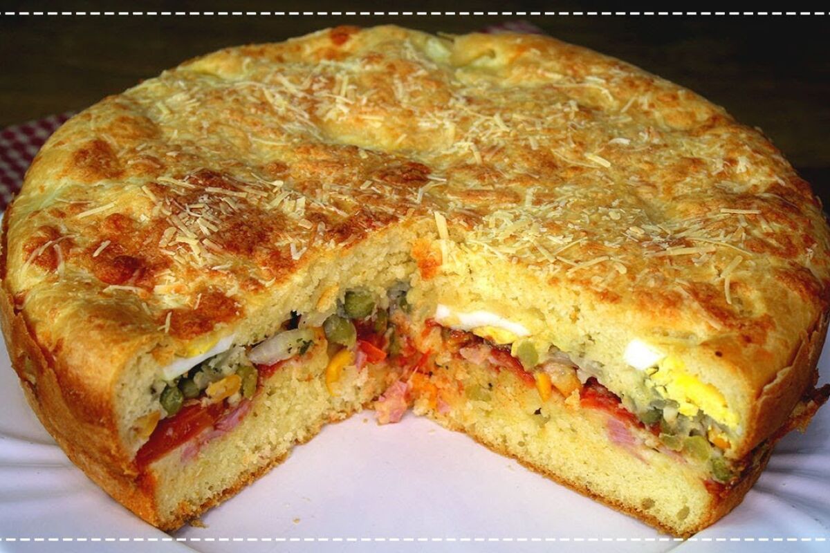 Torta salgada à portuguesa bem recheada e pronta para servir na hora do jantar 121 torta salgada à portuguesa