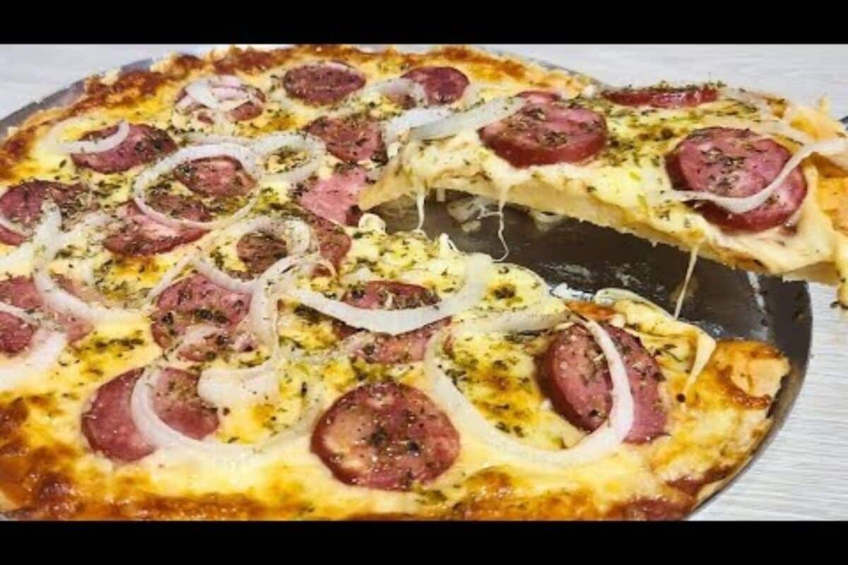 Massa caseira de pizza saborosa, fácil e rápida de preparar, perfeita para o jantar da família 3 Massa caseira de pizza