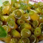 Doce de mamão enroladinho tradicional e saboroso, feito com calda cristalizada com gosto de infância 2 Doce de mamão enroladinho