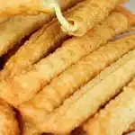 Cigarrete de queijo feito com apenas dois ingredientes, um aperitivo fácil, crocante e delicioso 1 Cigarrete de queijo